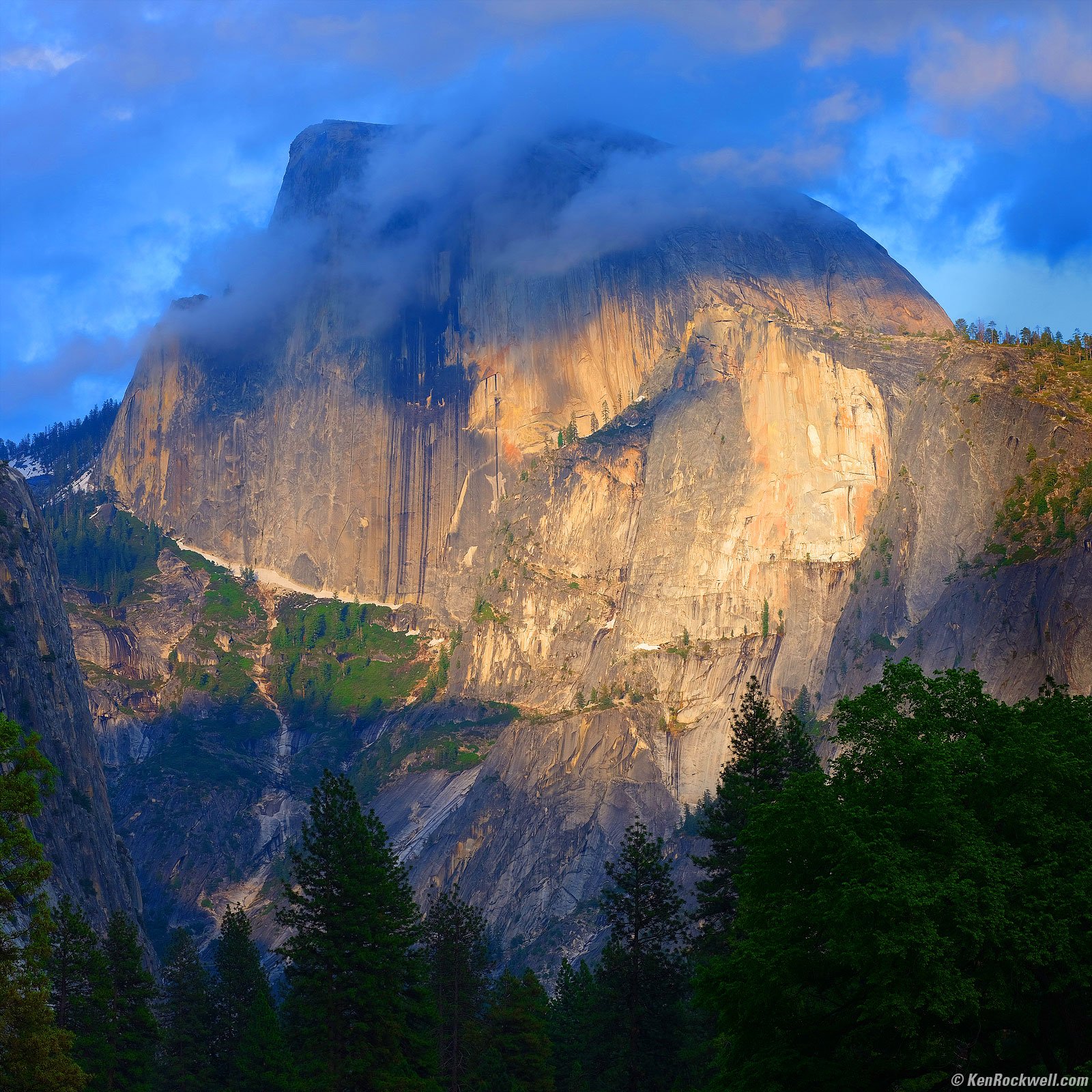 Half Dome in Clouds at Sunset